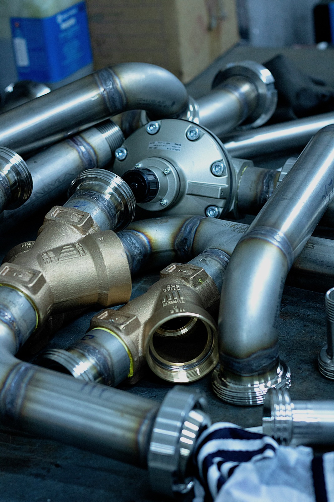 Assorted industrial pipes on table for Epo-Weld™ HTP high temperature potting compound sensor encapsulation application