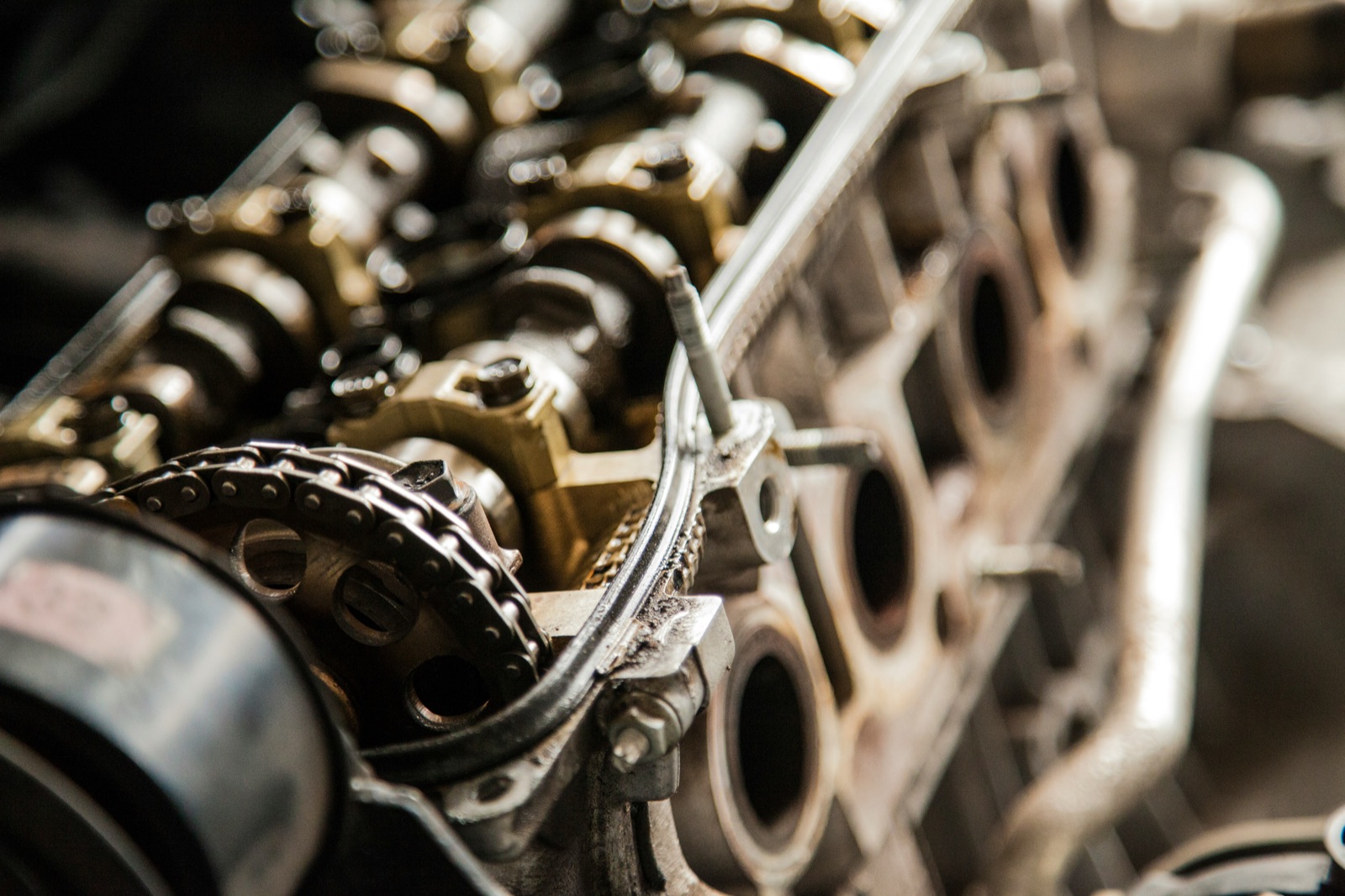Engine timing chain and cylinder head components for Pyra-Sil™ silicone conformal coating automotive electronics